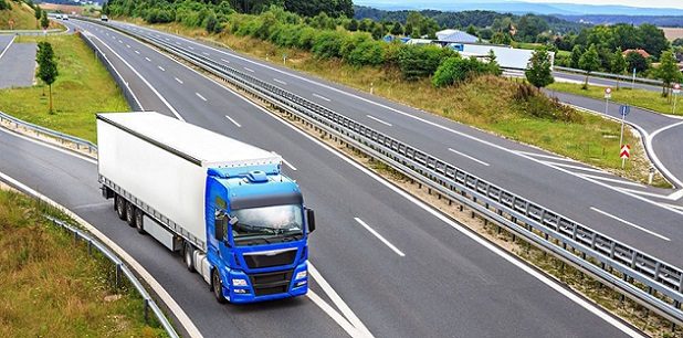 The stretch of motorway with a cargo truck